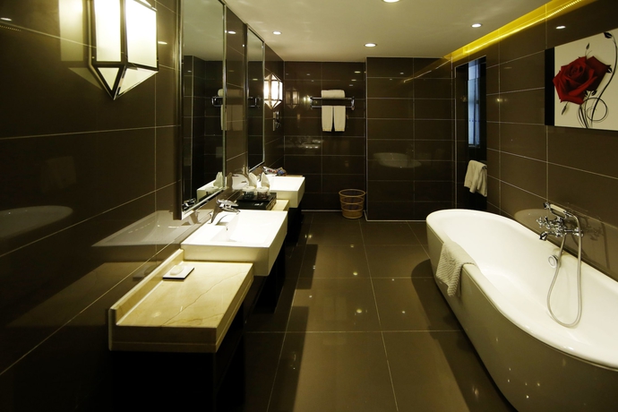 Imagen de la habitación del Hotel New Beacon Luguang International. Foto 4