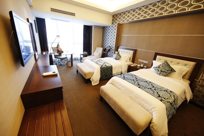 Imagen de la habitación del Hotel New Beacon Luguang International. Foto 6