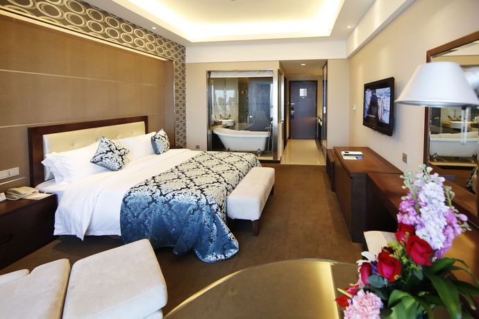 Imagen de la habitación del Hotel New Beacon Luguang International. Foto 9