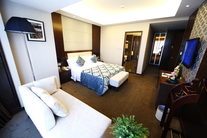 Imagen de la habitación del Hotel New Beacon Luguang International. Foto 13