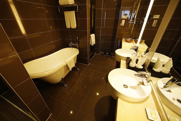Imagen de la habitación del Hotel New Beacon Luguang International. Foto 17