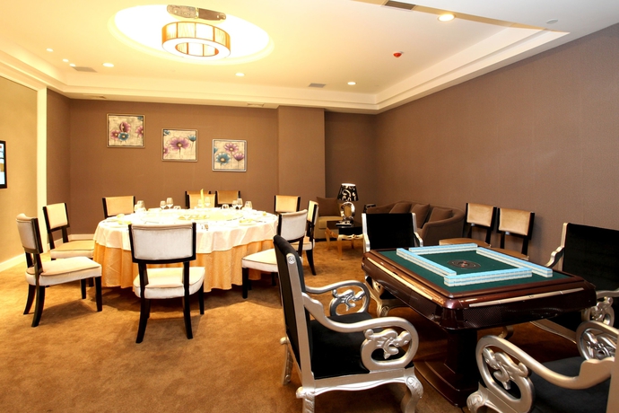 Imagen del bar/restaurante del Hotel New Beacon Luguang International. Foto 2