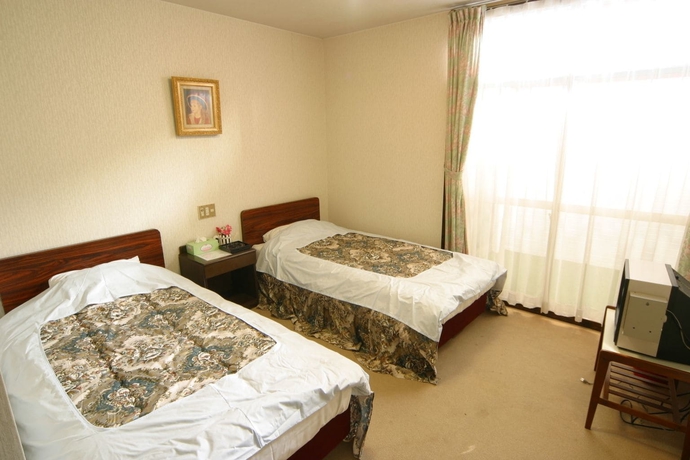 Imagen de la habitación del Hotel New Bernina. Foto 12
