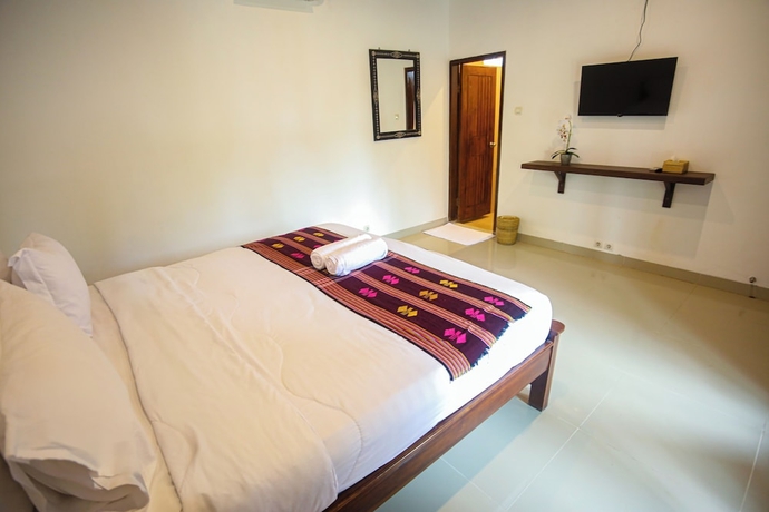 Imagen de la habitación del Hotel New Bintang Mandalika. Foto 3
