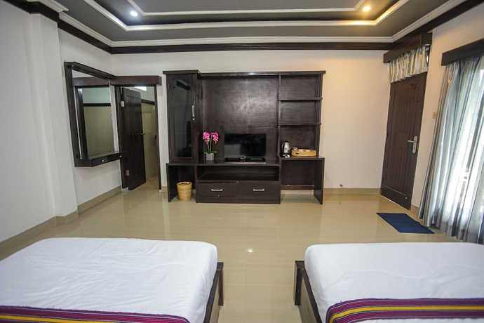 Imagen de la habitación del Hotel New Bintang Mandalika. Foto 5
