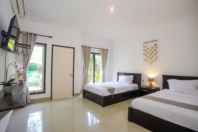 Imagen de la habitación del Hotel New Bintang Mandalika. Foto 9