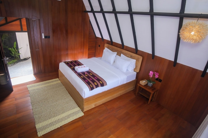 Imagen de la habitación del Hotel New Bintang Mandalika. Foto 11