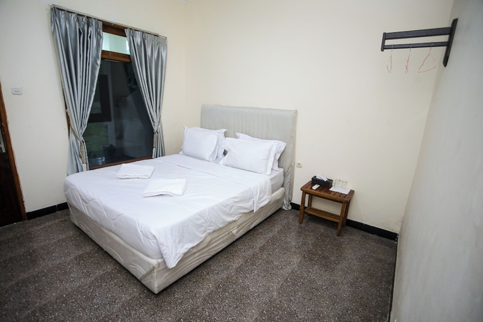 Imagen de la habitación del Hotel New Bintang Mandalika. Foto 12