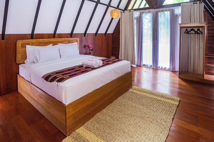 Imagen de la habitación del Hotel New Bintang Mandalika. Foto 13