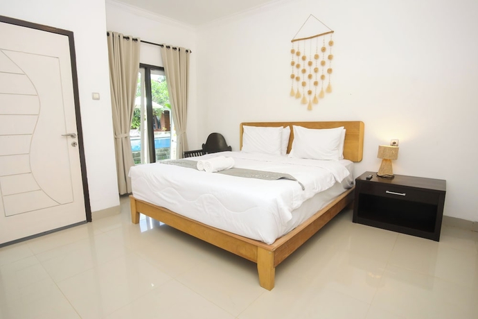Imagen de la habitación del Hotel New Bintang Mandalika. Foto 15