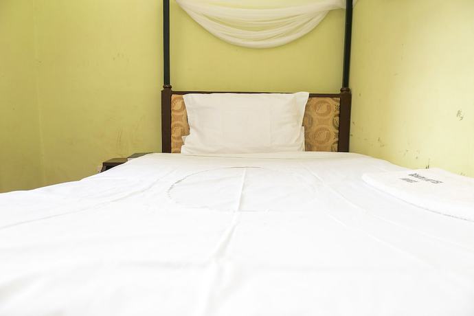 Imagen de la habitación del Hotel New Bondo. Foto 12
