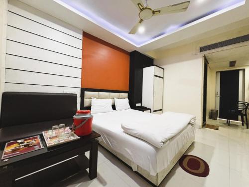 Imagen de la habitación del Hotel New Boss Inn. Foto 17