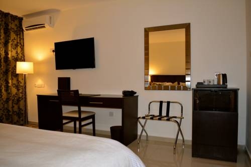 Imagen de la habitación del Hotel New Brookfields. Foto 7