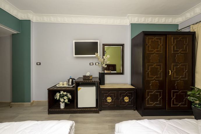 Imagen de la habitación del Hotel New Cairo Heart. Foto 17
