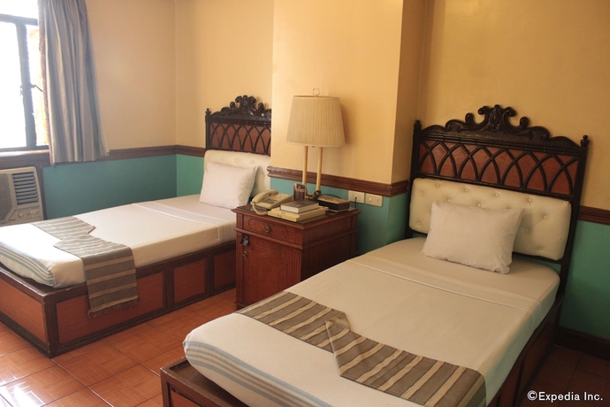 Imagen de la habitación del Hotel New Camelot. Foto 7