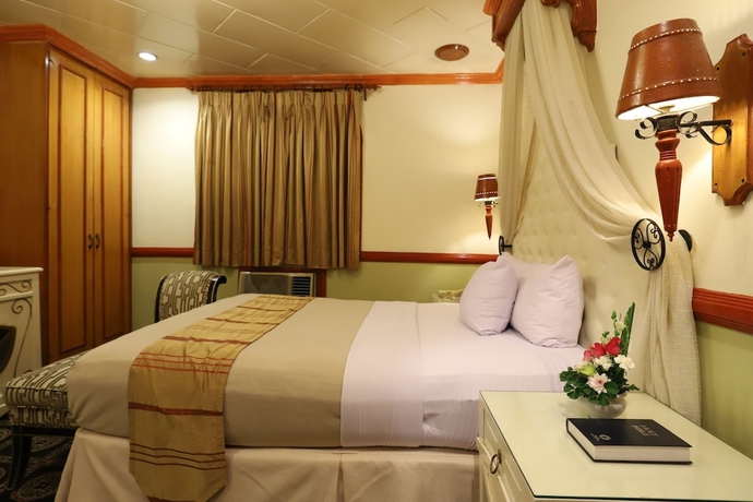 Imagen de la habitación del Hotel New Camelot. Foto 11