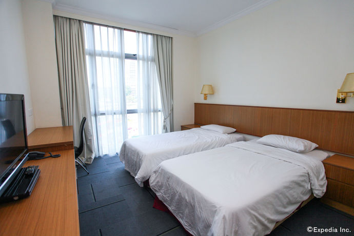 Imagen de la habitación del Hotel New Cape Inn (sg Clean). Foto 5