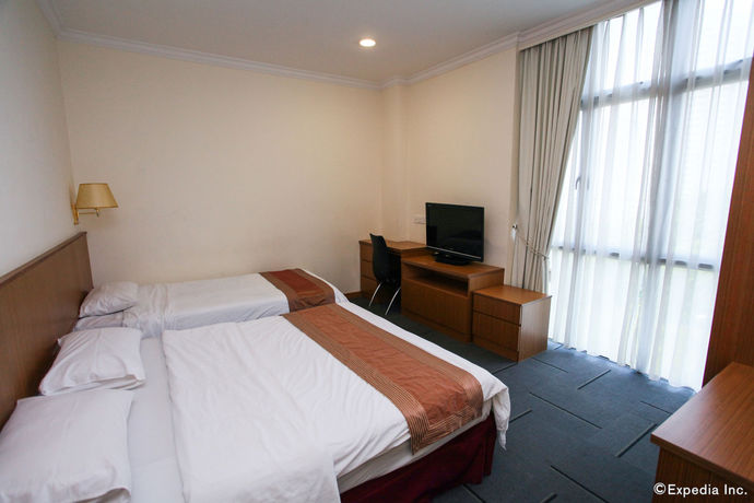 Imagen de la habitación del Hotel New Cape Inn (sg Clean). Foto 8