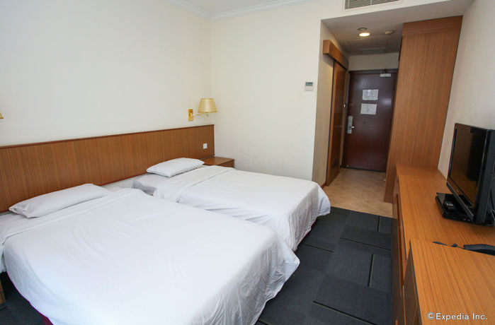 Imagen de la habitación del Hotel New Cape Inn (sg Clean). Foto 11