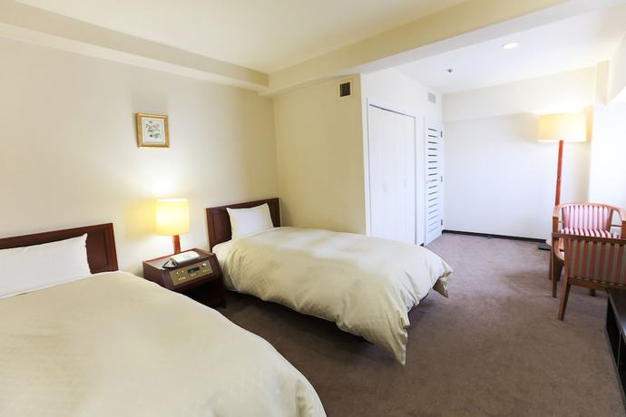 Imagen de la habitación del Hotel New Carina. Foto 3