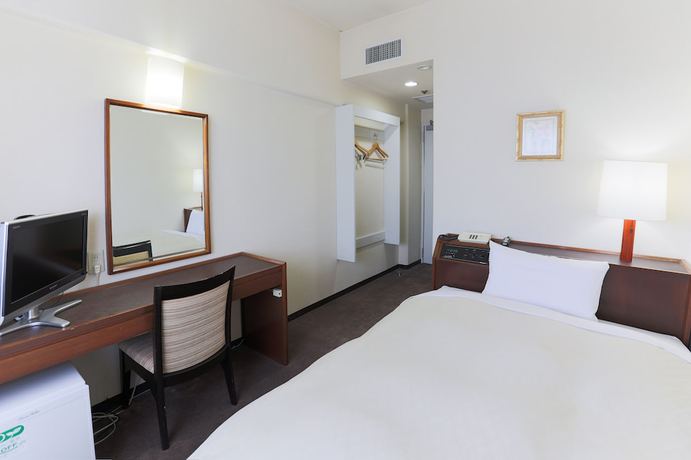 Imagen de la habitación del Hotel New Carina. Foto 5