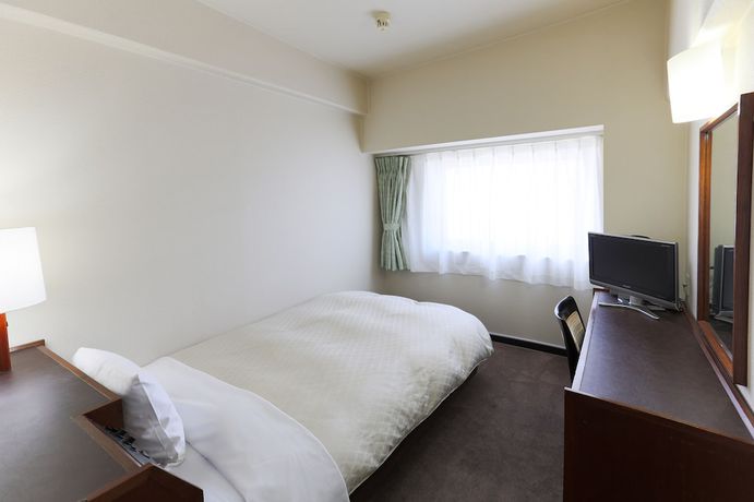 Imagen de la habitación del Hotel New Carina. Foto 6
