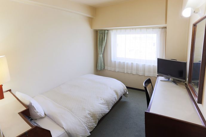 Imagen de la habitación del Hotel New Carina. Foto 7