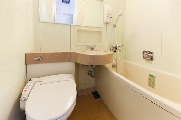 Imagen de la habitación del Hotel New Carina. Foto 8