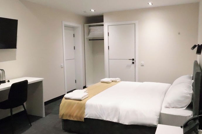 Imagen de la habitación del Hotel New Casa. Foto 8