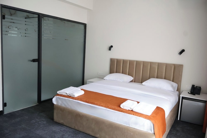 Imagen de la habitación del Hotel New Casa. Foto 10