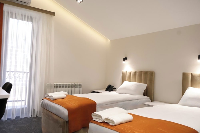 Imagen de la habitación del Hotel New Casa. Foto 12