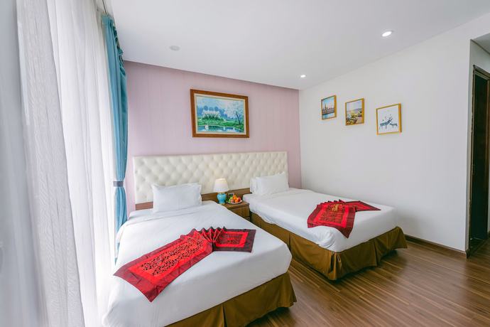 Imagen de la habitación del Hotel New Century Cau Giay. Foto 4