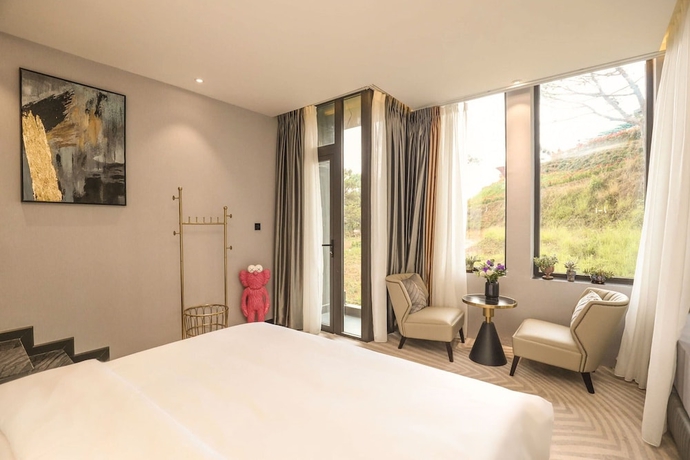 Imagen de la habitación del Hotel New Century Dalat. Foto 12