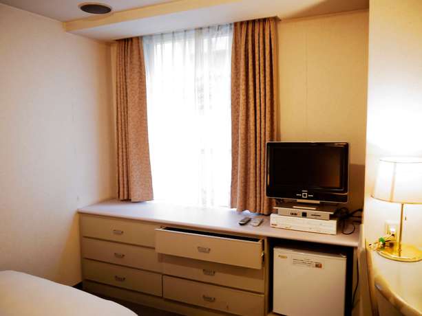 Imagen de la habitación del Hotel New Century. Foto 8