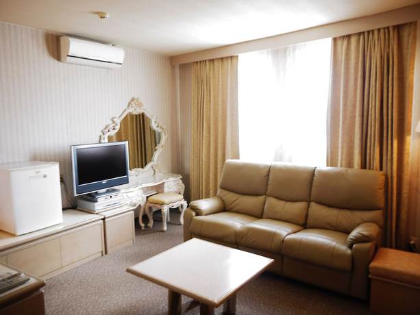 Imagen de la habitación del Hotel New Century. Foto 12