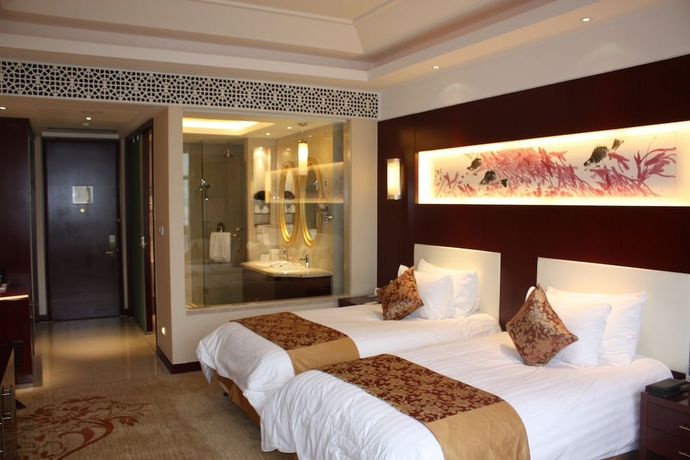 Imagen de la habitación del Hotel New Century Fengming Resort Zaozhuang. Foto 4