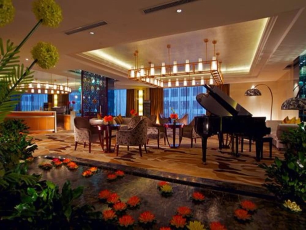 Imagen del bar/restaurante del Hotel New Century Fengming Resort Zaozhuang. Foto 2