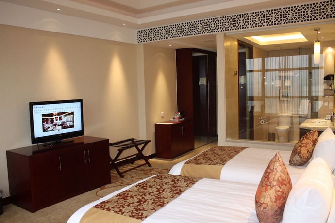 Imagen de la habitación del Hotel New Century Fengming Resort Zaozhuang. Foto 5