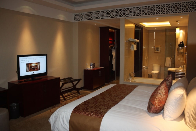 Imagen de la habitación del Hotel New Century Fengming Resort Zaozhuang. Foto 6