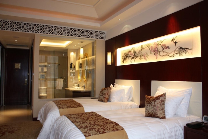 Imagen de la habitación del Hotel New Century Fengming Resort Zaozhuang. Foto 8