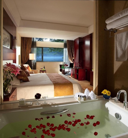 Imagen de la habitación del Hotel New Century Fengming Resort Zaozhuang. Foto 11