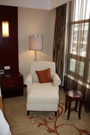 Imagen de la habitación del Hotel New Century Fengming Resort Zaozhuang. Foto 13