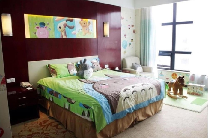 Imagen de la habitación del Hotel New Century Fengming Resort Zaozhuang. Foto 16