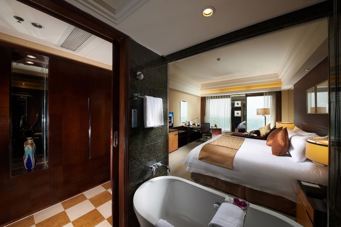 Imagen de la habitación del Hotel New Century Grand Hangzhou. Foto 7