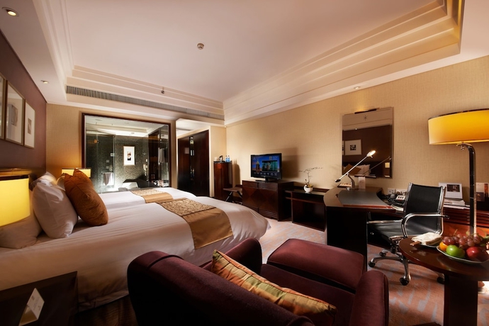 Imagen de la habitación del Hotel New Century Grand Hangzhou. Foto 9
