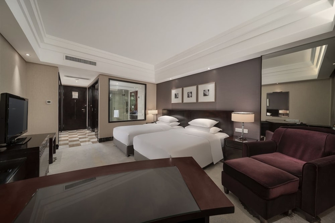 Imagen de la habitación del Hotel New Century Grand Hangzhou. Foto 10