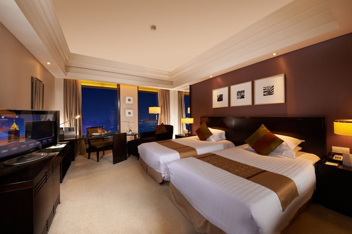 Imagen de la habitación del Hotel New Century Grand Hangzhou. Foto 11