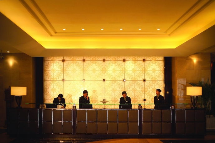 Imagen de los interiores del Hotel New Century Grand Hangzhou. Foto 19