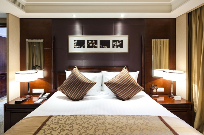 Imagen de la habitación del Hotel New Century Grand Hangzhou. Foto 12