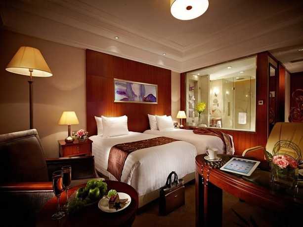 Imagen de la habitación del Hotel New Century Grand Hotel Huaian. Foto 4